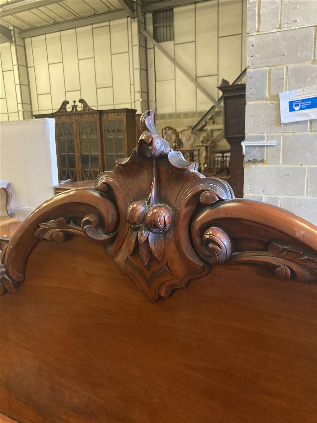 A Victorian carved mahogany sideboard fitted drawers and cupboard, length 150cm, depth 56cm, height 166cm